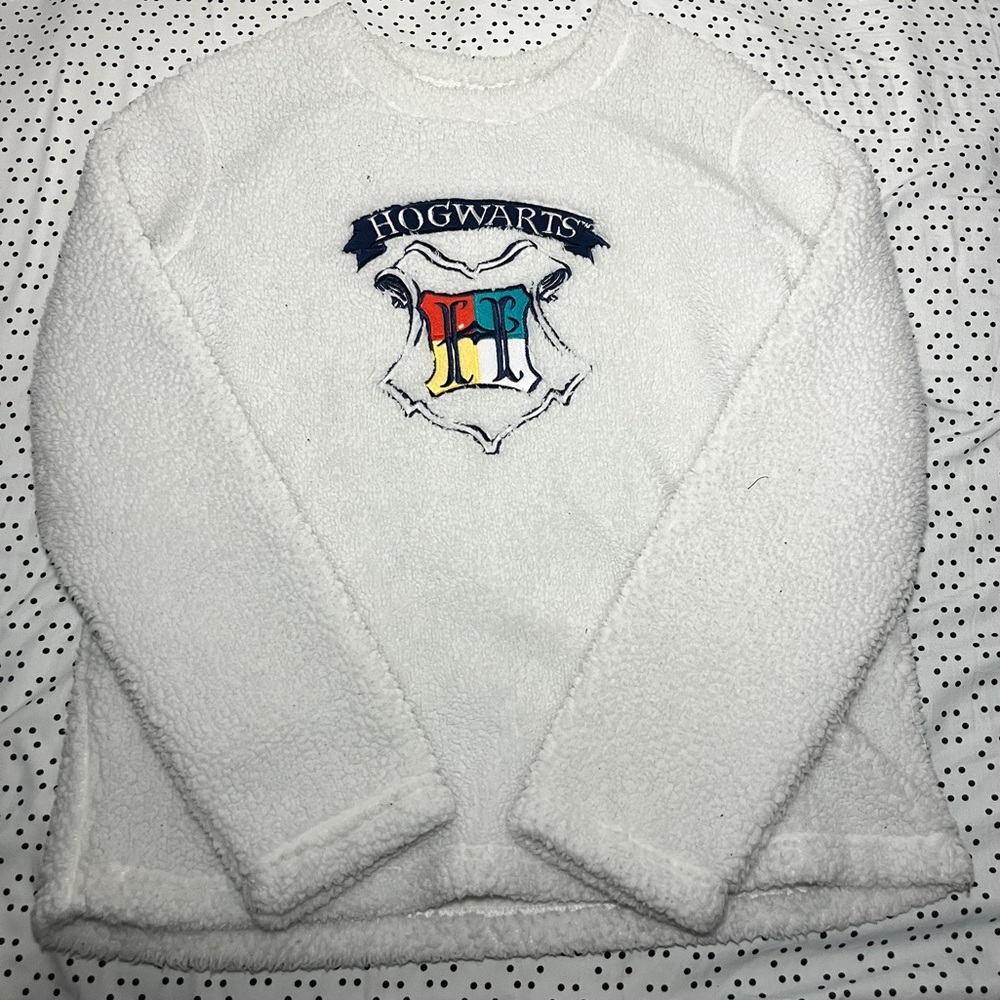 White fluffy women’s harry potter sweater.